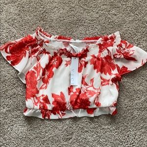 In bloom off the shoulder crop top.